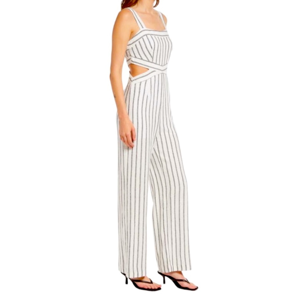 Great summertime striped linen jumpsuit with cutouts. Great for many occasions